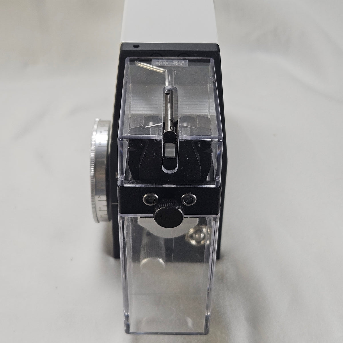 close up of front of 2015 wire stripper featuring jaws, blade holders, and safety shield