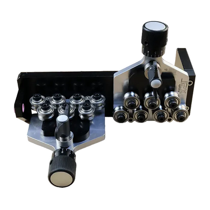close up of ws-12 dual plane wire straightener showing adjustment knobs and rollers and black anodized mount